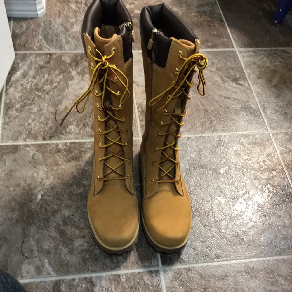 Women’s mid calf premium 14in zip timberland.